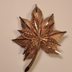 Cora gold tone double Leaf brooch pin
